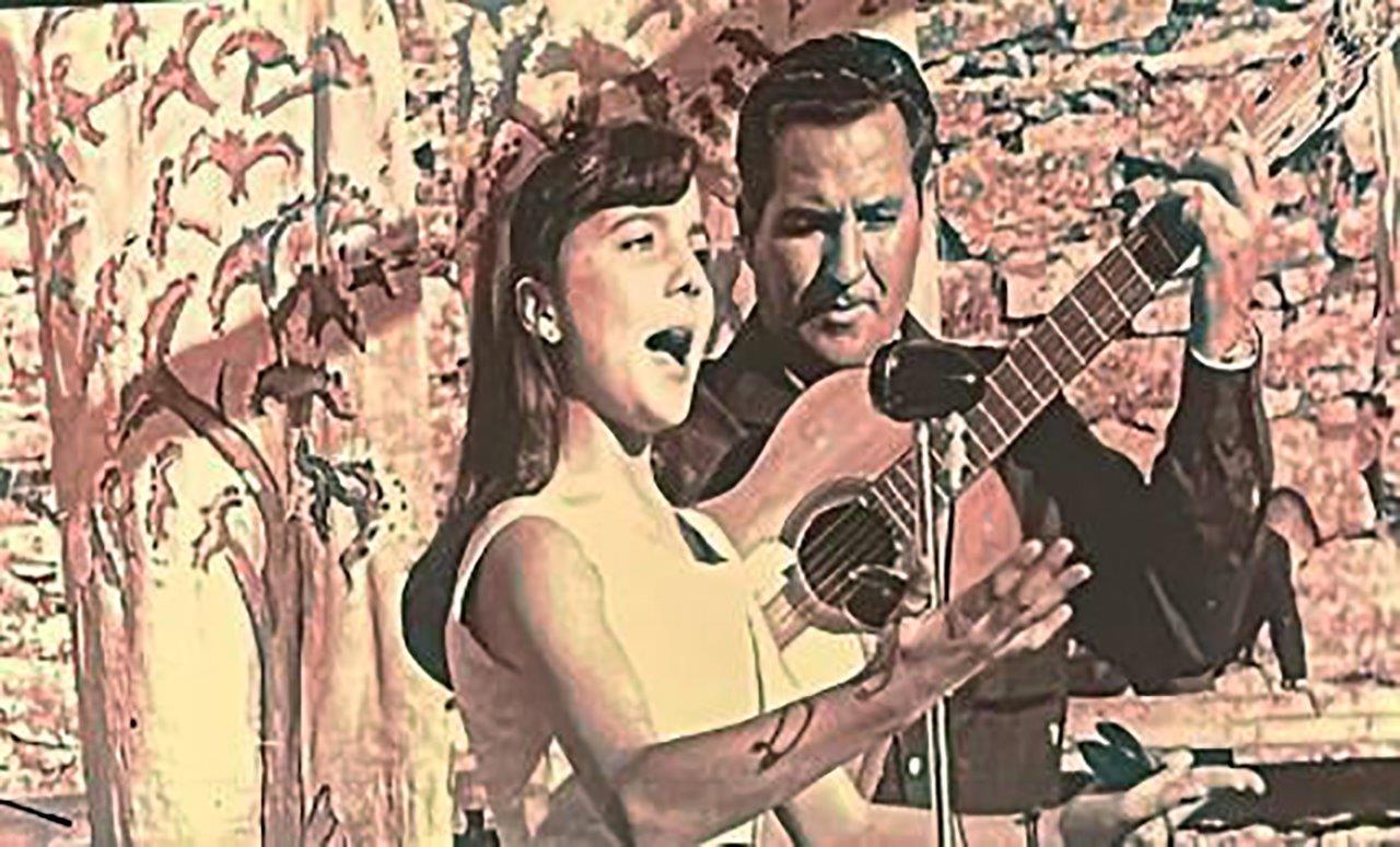 10. Actuación de Carmen Pacheco con su padre a la guitarra, hacia 1963.