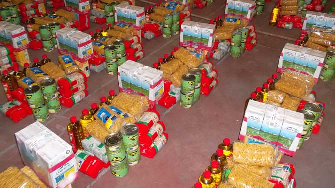 Lotes de alimentos preparados para su reparto.